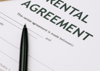 Pen and a rental agreement