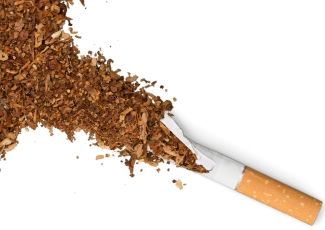 Tobacco spilling out of a split cigarette